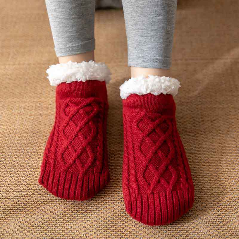 Chaussettes d'hiver antidérapantes en tricot doux pour femme.